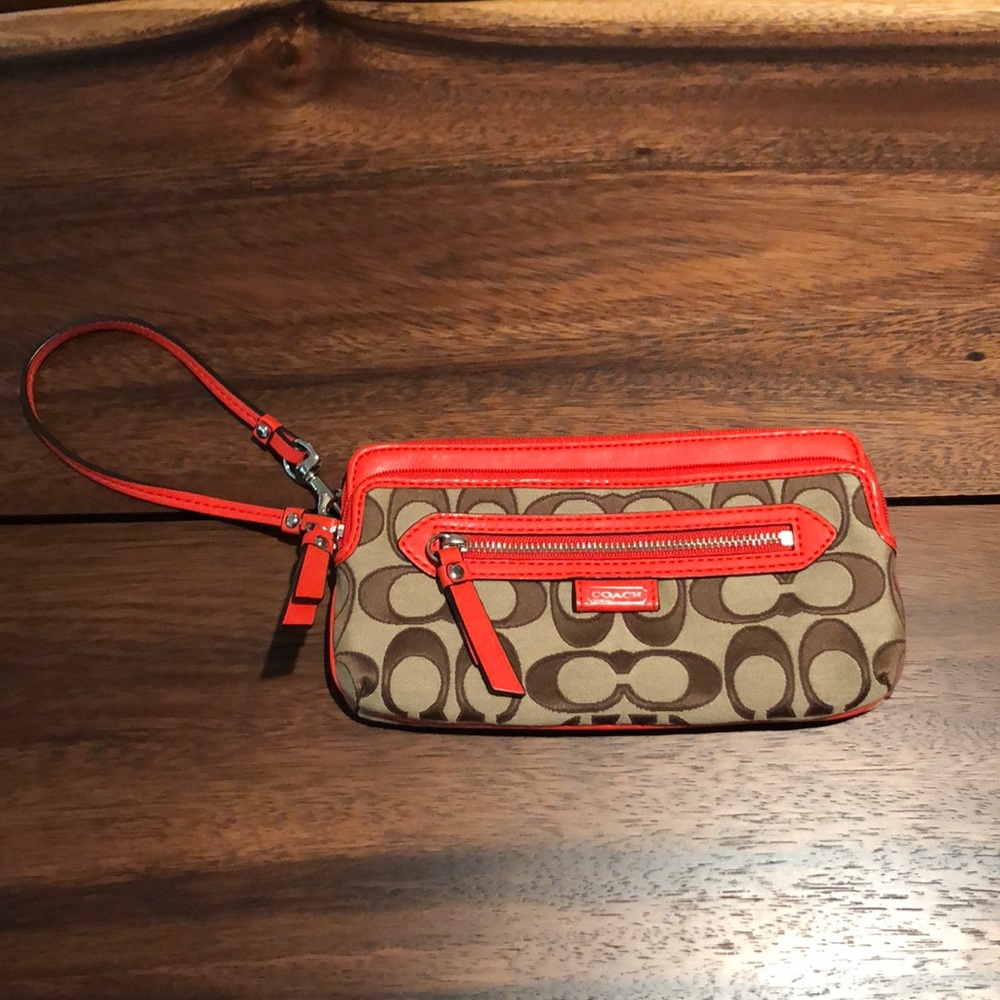 Coach orange/tan/brown wristlet